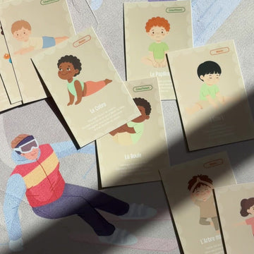 Kideo yoga cards placed on the mat